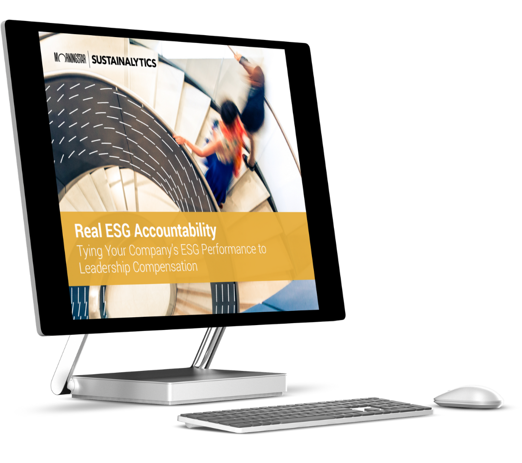 Ebook image on modern desktop computer - Real Accountability: Tying Your Company's ESG Performance to Leadership Compensation